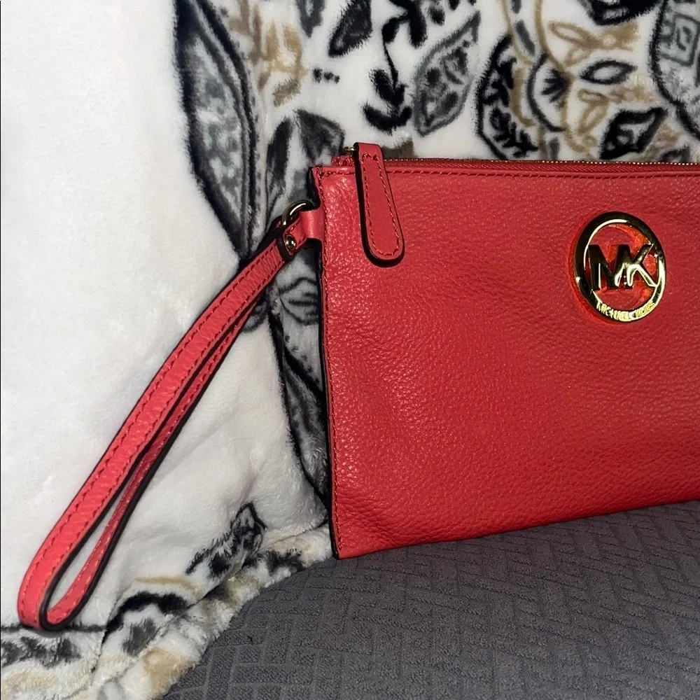 Michael Kors Coral Wristlet with Gold Logo